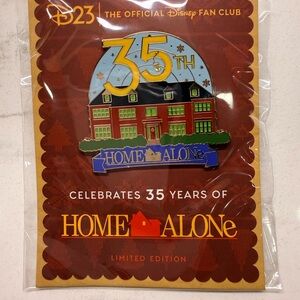 Disney D23 Fan Club Home Alone 35th anniversary Pin with Green and Red Design
